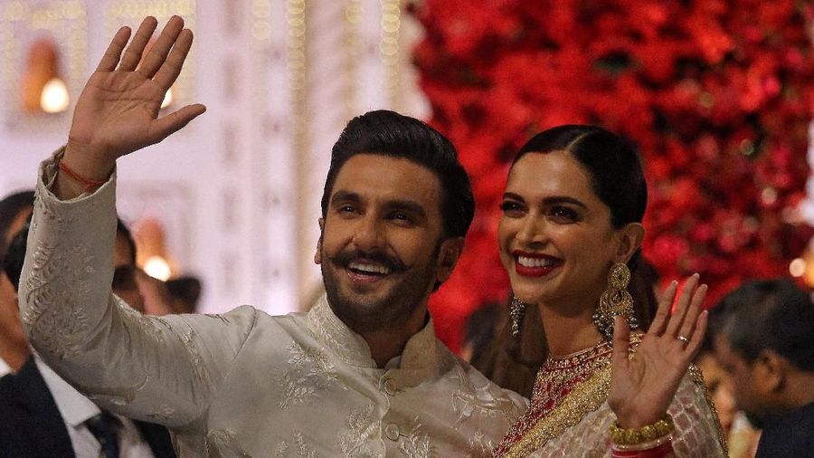 Bollywood actor Ranveer Singh and his wife actress Deepika Padukone leave after attending the wedding ceremony of Isha Ambani, the daughter of the Chairman of Reliance Industries Mukesh Ambani, in Mumbai, India, December 12, 2018. REUTERS/Francis Mascarenhas