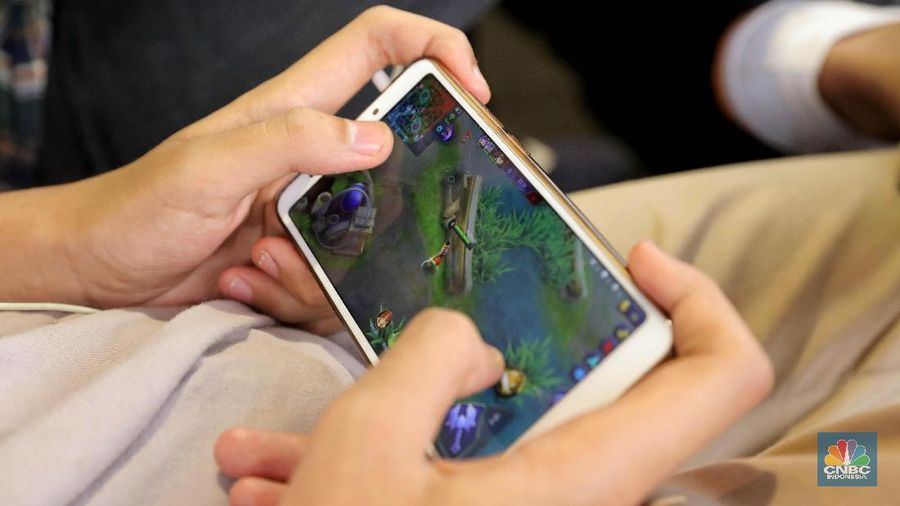 Peserta mengikuti Mobile Legend Competition dalam rangka merayakan Ulang tahun ke-17 di Lapangan Transcity, Tangerang Selatan, Jumat (14/12/2018).  (CNBC Indonesia/Andrean Kristianto)