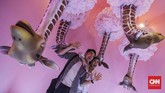 Wisata identik dengan kegiatan berfoto. Dan dalam rangka menyemarakkan tren sefie di Indonesia, pameran bertajuk 'HALUU: an Instagramable Exhibition' digelar di Plaza Indonesia, Jakarta, pada 15 Desember 2018 sampai 3 Maret 2019. (CNN Indonesia/ Hesti Rika)