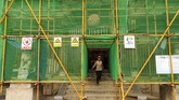 Pejabat daerah setempat memutuskan menghemat pengeluaran dengan memangkas investasi publik dalam proyek infrastruktur. Di sisi lain, penjualan lahan pemerintah setempat digencarkan demi menggemukkan pendapatan daerah. (REUTERS/Shu Zhang).