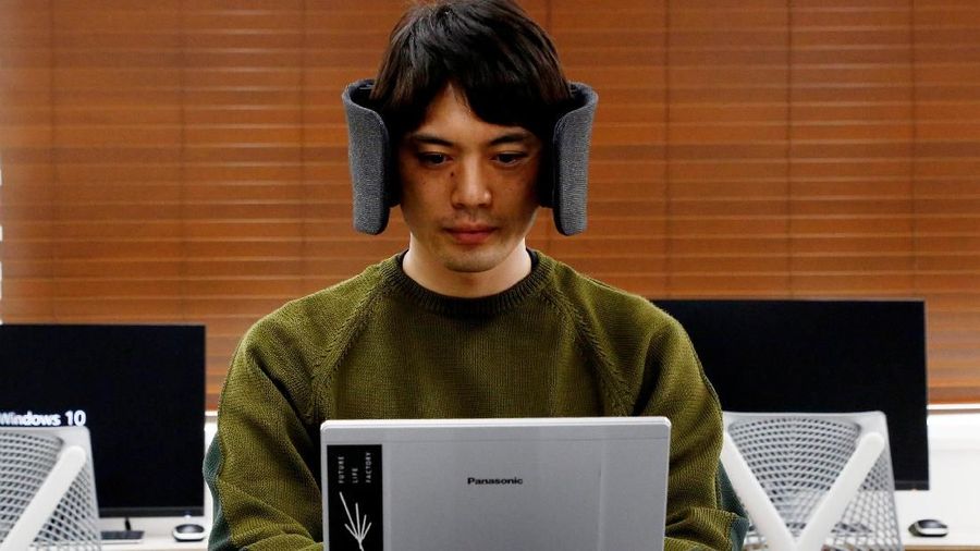 A designer of Panasonic demonstrates a prototype of 'Wear Space' during a photo opportunity in Tokyo, Japan, October 29, 2018. Picture taken October 29, 2018. REUTERS/Kim Kyung-Hoon