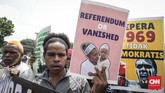 Operasi Trikora yang diperingati massa aktivis Papua itu adalah operasi militer pada era kepresidenan Soekarno selama hampir dua tahun untuk menggabungkan Papua bagian barat dengan wilayah Indonesia. (CNNIndonesia/Safir Makki)