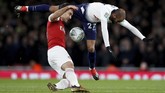 Arsenal menghadapi Tottenham Hotspur dalam laga perempat final Piala Liga 2018 di Stadion Emirates, Rabu (19/12). (Reuters/Andrew Couldridge)