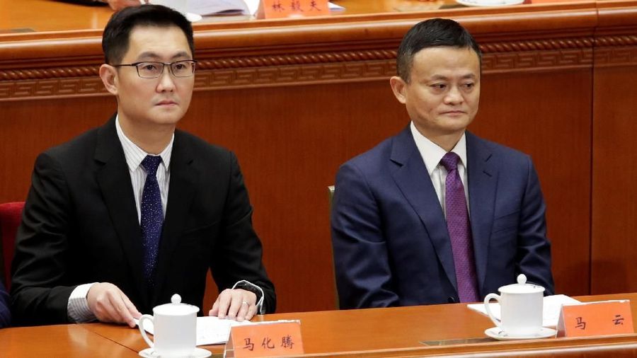 Tencent's Chief Executive Officer Pony Ma and Alibaba's Executive Chairman Jack Ma attend an event marking the 40th anniversary of China's reform and opening up at the Great Hall of the People in Beijing, China December 18, 2018.  REUTERS/Jason Lee