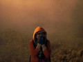 FOTO: Langkah Imigran di Perbatasan AS Diadang Gas Air Mata