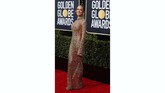 Kristin Cavallari mengenakan gaun emas berbahan tipis ke Golden Globe Awards. Gaun transparan yang berkilauan itu memperlihatkan lekuk tubuhnya yang langsing. REUTERS/Mike Blake
