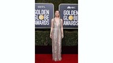 Saoirse Ronan mengenakan gaun perak dengan garis leher berpotongan rendah dari Gucci dipadukan riasan minimalis. Gaun transparan ini membuat kulitnya tampak samar-samar di balik busana. (REUTERS/Mike Blake)