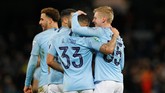 Kemenangan 9-0 membuat Manchester City hampir pasti lolos ke babak final Piala Liga meski harus menjalani laga tandang ke Burton Albion pada leg kedua. (REUTERS/Phil Noble)