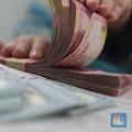 Pukul 13.00 WIB: Rupiah Menguat ke Rp 14.450/US$