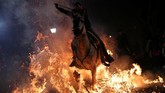 Perayaan menghormati Santo Anthony sebenarnya juga dilakukan di berbagai negara lain dengan penduduk Katolik. Namun kebanyakan berupa membawa hewan mereka ke gereja untuk diberkati dengan air suci. (REUTERS/Susana Vera)