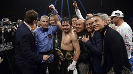 FOTO: Pacquiao Kalahkan Broner Lewat Kemenangan Angka Mutlak