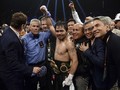 FOTO: Pacquiao Kalahkan Broner Lewat Kemenangan Angka Mutlak
