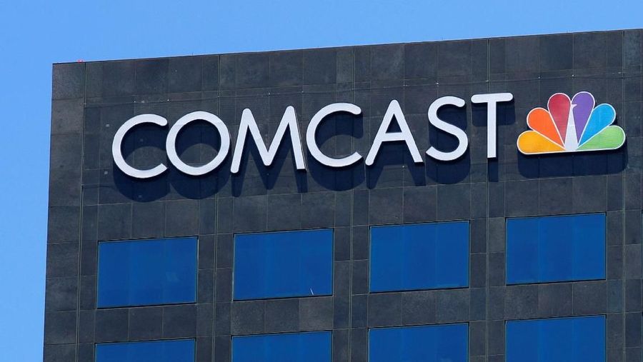 FILE PHOTO: The Comcast NBC logo is shown on a building in Los Angeles, California, U.S. June 13, 2018.        REUTERS/Mike Blake/File Photo    GLOBAL BUSINESS WEEK AHEAD
