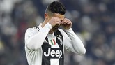 Hingga akhir pertandingan, Ronaldo tidak mampu menambah gol. Namun mantan pemain Real Madrid itu masih berada di posisi teratas daftar top skor dengan 14 gol. (REUTERS/Massimo Pinca)