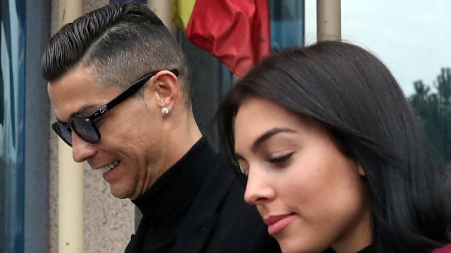 Portugal's soccer player Cristiano Ronaldo leaves with his girlfriend Georgina Rodriguez after appearing in court on a trial for tax fraud in Madrid, Spain, January 22, 2019. REUTERS/Susana Vera