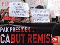 Jokowi Lempar Polemik Remisi Pembunuh Wartawan ke Yasonna