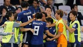 Jepang mencetak gol ketiga lewat Genki Haraguchi di masa injury time. Laga pun berakhir dengan skor 3-0. (REUTERS/Thaier Al-Sudani)