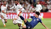 Jepang menghadapi Iran di babak semifinal Piala Asia 2019. Dalam perjalanan menuju semifinal, Iran tampil lebih meyakinkan dibandingkan Jepang. (REUTERS/Suhaib Salem)