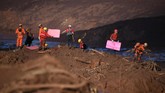Hingga saat ini tercatat 58 orang meninggal dan lebih dari 300 orang hilang dalam kejadian itu. (Mauro Pimentel / AFP)