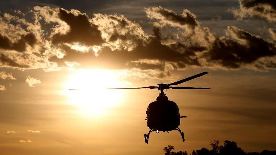 A rescue helicopter flies after a tailings dam owned by Brazilian mining company Vale SA collapsed, in Brumadinho, Brazil January 27, 2019. REUTERS/Adriano Machado