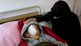 Saat itu Najjar bersama rekan-rekannya hanya iseng ikut demonstrasi karena merasa bosan. (REUTERS/Ibraheem Abu Mustafa)