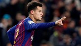 Philippe Coutinho membuka keunggulan 1-0 lewat penalti Philippe Coutinho. Lionel Messi memberikan kesempatan jadi eksekutor kepada Coutinho. (REUTERS/Albert Gea)