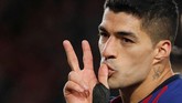 Setelah sempat kebobolan oleh Guilherme Arana, Luis Suarez mencetak gol kelima Barcelona di menit ke-89. (REUTERS/Albert Gea)