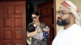 Mina bahkan sangat senang ketika berada di daftar tunggu untuk mengikuti misa yang dipimpin oleh Paus Francis di Semenanjung Arab. (REUTERS/Ahmed Jadallah)