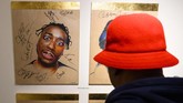 Pembukaan museum itu dihadiri Sugarhill Gang, yang disebut sebagai pionir hip hop. (ANDREW CABALLERO-REYNOLDS / AFP)