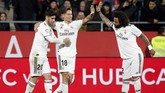 Real Madrid memperbesar keunggulan menjadi 3-1 melalui gol Marcos Llorente pada menit ke-76 setelah menerima umpan Daniel Ceballos. (REUTERS/Albert Gea)