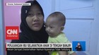 Perjuangan Ibu Selamatkan Anak di Tengah Banjir