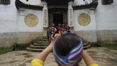 Apalagi pemerintah tengah menggembar-gemborkan wisata sebagai salah satu cara mengentaskan Hmong di Ha Giang dari kemiskinan. Kawasan itu, dengan segala budaya tradisionalnya, ditargetkan menjadi daya tarik wisata Vietnam per 2030. (Nhac NGUYEN / AFP)