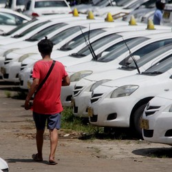 Tekan Beban, Rugi Taksi Express Berkurang Jadi Rp 276 M