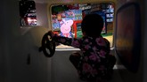 Sejak 5 Februari lalu, Peppa tiba-tiba menjadi bintang di China dengan rilisnya film bertajuk 'Peppa Pig Celebrates Chinese New Year'. (Photo by WANG Zhao / AFP)