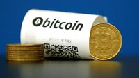 A Bitcoin (virtual currency) paper wallet with QR codes and a coin are seen in an illustration picture shot May 27, 2015. REUTERS/Benoit Tessier