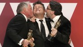 Film 'Bohemian Rhapsody' yang mengisahkan perjalanan band Queen meraih piala Oscar dalam kategori Sound Mixing yang diberikan untuk Paul Massey, Tim Cavagin dan John Casali. (REUTERS/Mike Segar)