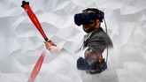 Virtual Reality (VR) menjadi salah satu teknologi yang dipamerkan. Mobile World Congress tahun ini diselenggarakan hingga 28 Februari 2019. (AFP/ GABRIEL BOUYS)