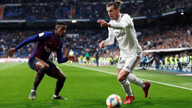 Gareth Bale dimasukkan ke lapangan pada menit ke-68 untuk menggantikan Lucas Vazquez. (REUTERS/Juan Medina)