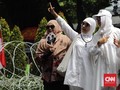 Massa Aksi Apel FUI Memekik Takbir Sembari Acungkan Dua Jari