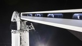 Kapsul Crew Dragon dengan tinggi 4,9 meter ini berhasil terlepas dari roket setelah meluncur 11 menit kemudian. Kapsul itu lantas melanjutkan perjalanannya menuju ISS. (SpaceX via AP)