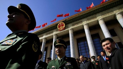 Delegasi militer meninggalkan Aula Besar Rakyat setelah sesi pembukaan Kongres Rakyat Nasional (NPC) di Beijing, Cina, 5 Maret 2019. REUTERS / Aly Song Military delegates leave the Great Hall of the People after the opening session of the National People's Congress (NPC) in Beijing, China, March 5, 2019. REUTERS/Aly Song