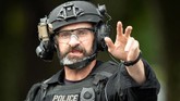 Ardern mengatakan Selandia Baru telah memberlakukan status keamanan tertinggi guna merespons insiden ini. (Reuters/SNPA/Martin Hunter)