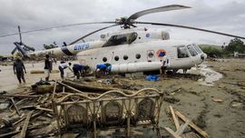FOTO: Banjir Sapu Sentani, Seret Mobil Hingga Helikopter