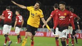 Manchester United gagal lolos ke semifinal setelah disingkirkan Wolverhampton Wanderers dengan skor 1-2. Gol pembuka Wolves dicetak oleh Raul Jimenez. (AP Photo/Rui Vieira)
