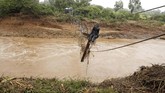 Badai Idai menyebabkan 98 orang meninggal dan 217 hilang di Zimbabwe. (REUTERS/Philimon Bulawayo)