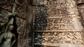 Salah satu keindahan candi Ta Phrom yang alami terkena paparan sinar matahari. (REUTERS/Samrang Pring)