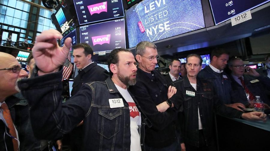The Levi Strauss & Co. logo is seen on displays on the floor of the New York Stock Exchange (NYSE) during the company's IPO in New York, U.S., March 21, 2019. REUTERS/Lucas Jackson