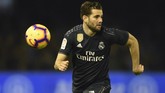 Bek Real Madrid Nacho Fernandez masuk radar AS Roma. AS mengklaim kedatangan Eder Militao membuat Nacho hampir pasti mendapat ruang bermain musim depan. (MIGUEL RIOPA / AFP)