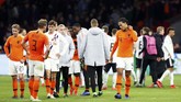 Kapten timnas Belanda Virgil van Dijk bereaksi usai dikalahkan Jerman. Kemenangan membuat Jerman berada di posisi dua klasemen Grup C, tertinggal tiga poin dari Irlandia Utara. (REUTERS/Francois Lenoir)