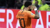 Gelandang serang timnas Belanda Memphis Depay merayakan gol ke gawang timnas Jerman. (REUTERS/Piroschka Van De Wouw)